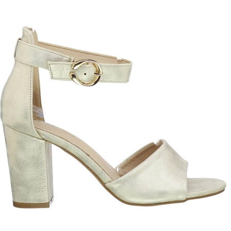 Złote sandały damskie z zakrytą piętą na obcasie Jezzi