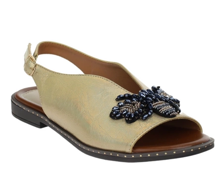 Złote sandały damskie eleganckie na płaskiej podeszwie Jezzi