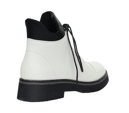 Białe buty zimowe damskie na płaskiej podeszwie eleganckie i wygodne Jezzi
