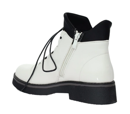 Białe buty zimowe damskie na płaskiej podeszwie eleganckie i wygodne Jezzi