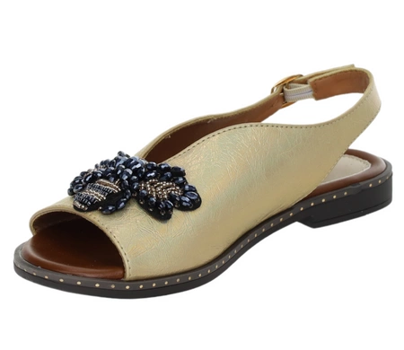 Złote sandały damskie eleganckie na płaskiej podeszwie Jezzi